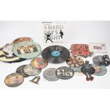 A collection of picture disc vinyl records, 33rpm and 45rpm, various artists, including David Bowie,