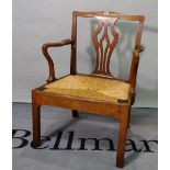 A George III mahogany framed open armchair, on block supports, 60cm wide x 90cm high.