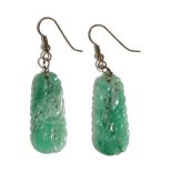 A pair of pierced and carved jadeite pendant earrings, of tapered plaque design,