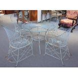 A 20th century white painted wirework circular table on four outswept supports, 100cm diameter,