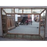 A 20th century gilt framed rectangular marginal mirror, 126cm wide x 90cm high.