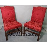 A set of six George III style hump back dining chairs, on canted mahogany supports,