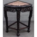 An early 20th century Chinese corner jardiniere stand,