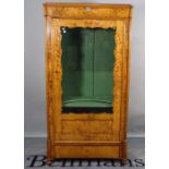 A 19th century North European satin birch display cabinet, over single drawer on turned supports,