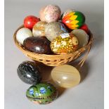 A quantity of modern decorative hardstone eggs.