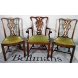 A matched set of eight George III style mahogany splatback dining chairs, to include two carvers,