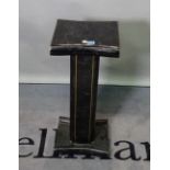 A modern faux black marble pedestal, 30cm wide x 72cm high.