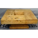 A modern oak square coffee table, on plinth base, 90cm wide x 40cm high.