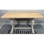 An 18th century style grey painted oak kitchen table, 143cm wide x 74cm high.