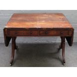 A Regency rosewood sofa table, with a pair of frieze drawers on downswept supports,