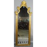 A modern gilt framed arch top wall mirror, 59cm wide x 162cm high.