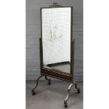 A 20th century French metal framed cheval mirror on four downswept supports, 80cm wide x 182cm high.