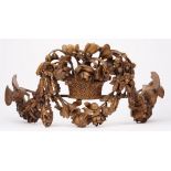An English limewood carving, 19th century, in the manner of Grinling Gibbons,