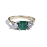 An 18ct gold, emerald and diamond three stone ring,
