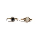 A 9ct gold ring, collet set with an oval opal between split shoulders, ring size O and a 9ct gold,