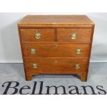 A 19th century mahogany chest of two short and two long drawers on bracket feet,