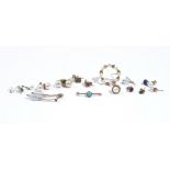 A cultured pearl brooch, designed as a wreath, a pale blue gem set lace pin, six pairs of earrings,