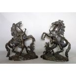 A pair of modern spelter figures of Marley horses, 43cm high, (2).