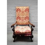 A 17th century French style walnut framed square back open armchair,