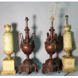 A pair of early 20th century cast metal table lamps, of urn form, 71cm high,
