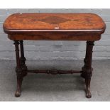 A Victorian figured walnut rounded rectangular card table, on four scroll supports,