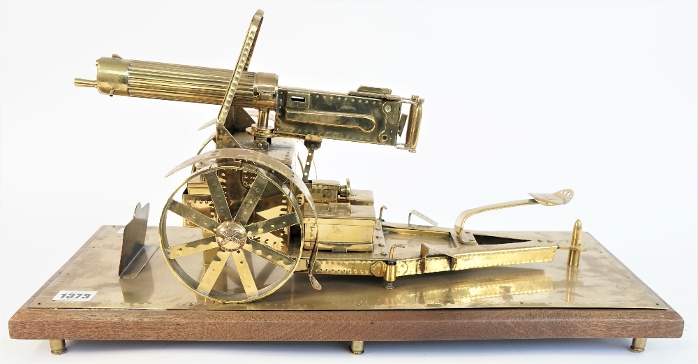 A brass model of a WWI Vickers machine gun, 20th century,