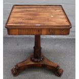 A Regency rosewood single drawer side table, on reeded column and three scroll feet,