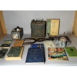Automobilia, a 'Pratts' petrol can, assorted car books, torch and sundry.