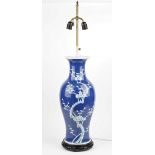 A Chinese blue and white baluster shape vase, late 19th/20th century, painted with flowering prunus,