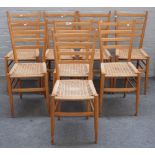 In the manner of GIO PONTI, a set of six beech ladder back mid-20th century dining chairs,