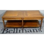 A modern stained beech two tier rectangular coffee table, 120cm wide x 47cm high.