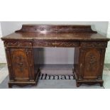 A Regency style mahogany inverted breakfront pedestal sideboard,
