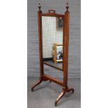 An early 19th century mahogany boxwood and ebony strung cheval mirror,