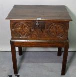 An 18th century and later oak lift top bible box on stand, 60cm wide x 69cm high.