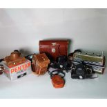 A quantity of mostly 20th century cameras and accessories.