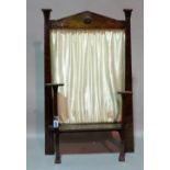 An Arts and Crafts copper covered wooden fire screen,