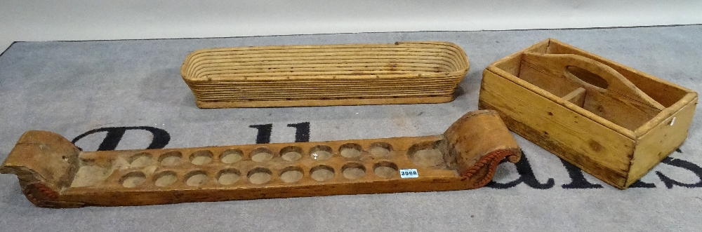 Collectables, comprising; a fruitwood twin handled eighteen division egg tray, 95cm wide,