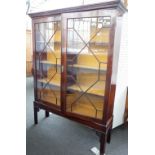 A George III mahogany astragal glazed two door display cabinet, on later stand,