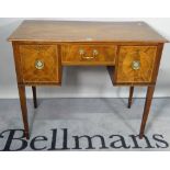 A late George III mahogany kneehole writing desk,