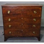 A late George III mahogany secretaire chest, of four long graduated drawers on splayed bracket feet,