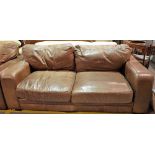 A modern brown leather sofa on block feet, 200cm wide.