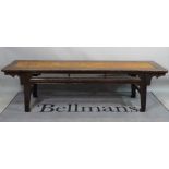 An early 20th century Chinese simulated elm bench, 196cm x 54cm.