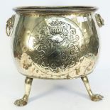 A Victorian polished brass log bin of circular form,