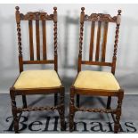 A set of four 18th century style oak highback dining chairs, 45cm wide x 108cm high.