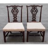 A pair of George II mahogany dining chairs,
