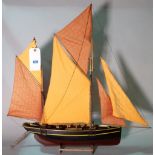 A modern wooden model of a spice clipper, 84cm wide x 87cm high.