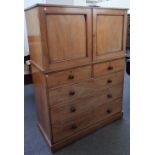 A Victorian mahogany linen press, the pair of doors over two short and three long graduated drawers,