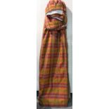 A pair of modern lined and interlined orange and purple checked curtains,