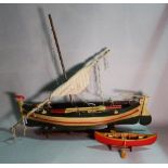 A modern wooden model of a sailing boat, 81cm wide x 26cm high. (a.f.
