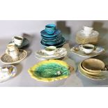 A group of mainly 20th century dinner services, a quantity of blue glaze plates and sundry.